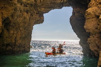 Tour with sea kayaks to the Ponta da Piedade rocky coast, rugged coastal landscape, right next to