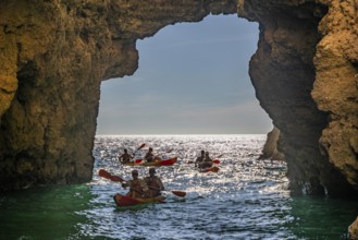 Tour with sea kayaks to the Ponta da Piedade rocky coast, rugged coastal landscape, right next to