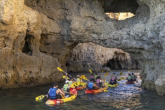 Tour with sea kayaks to the Ponta da Piedade rocky coast, rugged coastal landscape, right next to