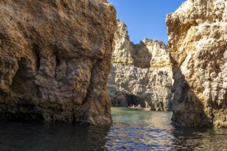 Tour with sea kayaks to the Ponta da Piedade rocky coast, rugged coastal landscape, right next to