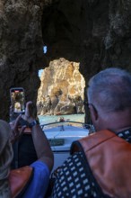 Tour with a small motorboat to the Ponta da Piedade rocky coast, rugged coastal landscape, right