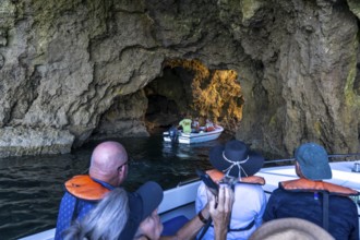 Tour with a small motorboat to the Ponta da Piedade rocky coast, rugged coastal landscape, right