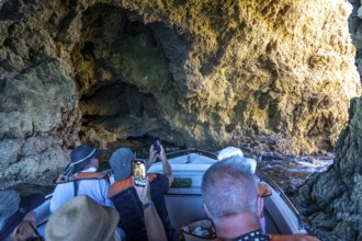 Tour with a small motorboat to the Ponta da Piedade rocky coast, rugged coastal landscape, right