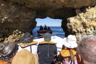 Tour with a small motorboat to the Ponta da Piedade rocky coast, rugged coastal landscape, right