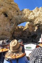 Tour with a small motorboat to the Ponta da Piedade rocky coast, rugged coastal landscape, right