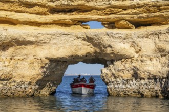 Tour with a small motorboat to the Ponta da Piedade rocky coast, rugged coastal landscape, right