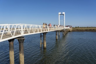 Bridge over the lagoon to the kilometre-long sandy beach Praia do Barril, on the island off Santa