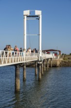 Bridge over the lagoon to the kilometre-long sandy beach Praia do Barril, on the island off Santa