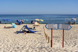 Kilometre-long sandy beach Praia do Barril, on the island off Santa Luzia, Algarve, Portugal