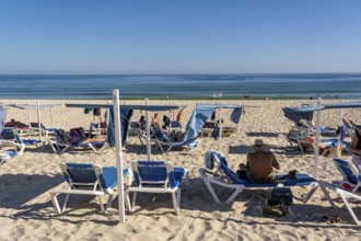 Kilometre-long sandy beach Praia do Barril, on the island off Santa Luzia, Algarve, Portugal