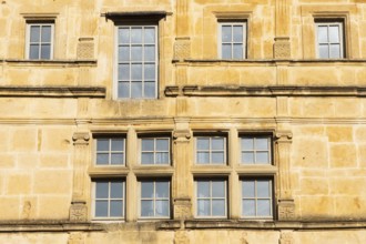 Window, historic house facade, yellow sandstone, Marville, Renaissance village, Département Meuse,