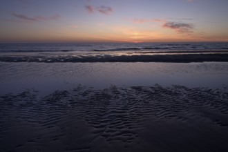 Sunset on the beach of the North Sea, Texel, North Holland, Netherlands