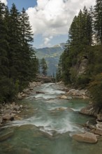 River ache in front of the Krimml waterfall, highest waterfall in Europe, Hohe Tauern National