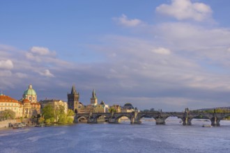 Charles Bridge (Karluv Most) on Vltava river and Old Town Bridge Tower, famous tourist destination