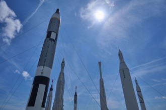 Rockets in a formation under bright sunshine and blue sky, Kennedy Space Centre Visitor Complex,