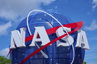 NASA logo in front of a blue, cloudy sky, Kennedy Space Centre Visitor Complex, Merritt Island,