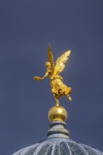 Fama (the goddess of rumours) on the dome of the Academy of Fine Arts, Dresden, Saxony, Germany