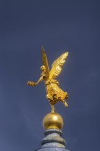 Fama (the goddess of rumours) on the dome of the Academy of Fine Arts, Dresden, Saxony, Germany