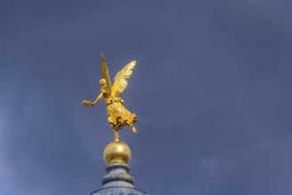 Fama (the goddess of rumours) on the dome of the Academy of Fine Arts, Dresden, Saxony, Germany