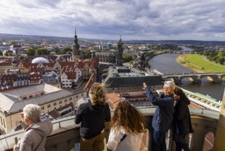Tourists enjoying the view from the lantern of the Church of Our Lady, Dresden, Saxony, Germany