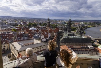 Tourists enjoying the view from the lantern of the Church of Our Lady, Dresden, Saxony, Germany