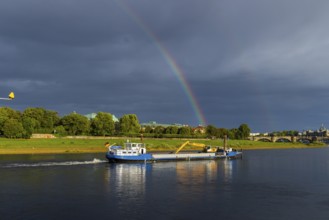 Dredger Domarin with rainbow over the Elbe at Neustädter Elbufer, Dresden, Saxony, Germany