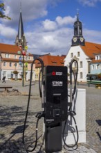 Sachsen Energie charging station on the market square with the old town hall, Wilsdruff, Saxony,