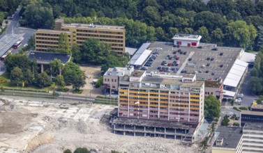 Aerial view, town hall and town hall square as well as construction site with demolition of the