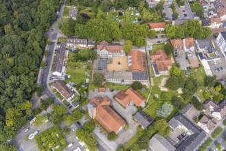 Aerial view, St. Elisabeth Catholic Church and Pestalozzi School and Catholic Kindergarten in