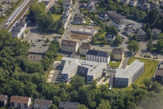 Aerial view, construction site and new building care centre, building complex for assisted living,