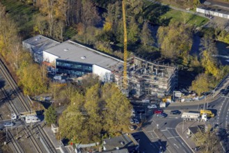 Aerial view, construction site with extension Eglo Leuchten Handels GmbH in the district Neheim in