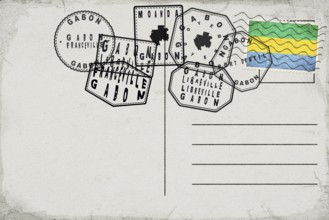 Gabon Vintage Postcard with Flag Stamp and City Postmarks