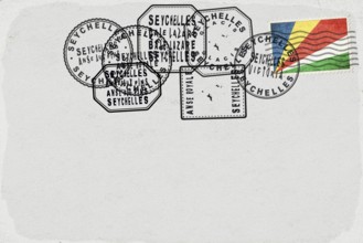 Seychelles Vintage Postcard with Flag Stamp and City Postmarks