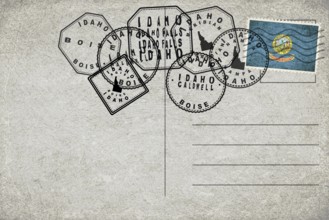Idaho Vintage Postcard with Flag Stamp and City Postmarks