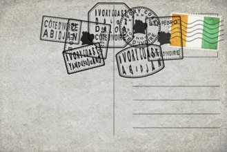 Ivory Coast Vintage Postcard with Flag Stamp and City Postmarks