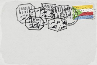 Comoros Vintage Postcard with Flag Stamp and City Postmarks