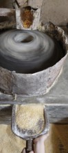 Water mill for grinding corn, Mill Stone, Making corn flour, Minas Gerais, Brazil