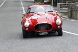 No. 254, Ferrari 250 MM berinetta Pinin Farina, built in 1953, red retro car drives head-on on an