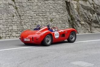 No. 373, Maserati 300 S Fantuzzi, year of construction 1955, Red racing car driving along a winding