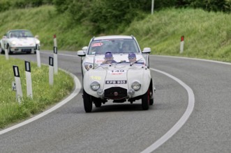 White classic car on rural road in green surroundings, classic car, car race, Mille Miglia, 1000