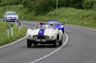 White classic car accompanied by a blue vehicle on a country road, classic car, car race, Mille