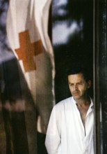 BIH, Bosnia, Sarajevo, 07.09.1992, A doctor looks through the window of the Kosevo Hospital, in