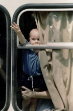 BIH, Bosnia, Sarajevo, 16.09.1992, children waving from a bus that brings refugees out of the city