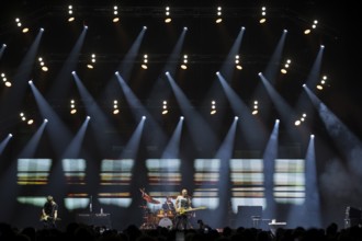 Dominic Miller (guitarist), Chris Maas (drummer), Sting (guitarist, real name: Gordon Matthew