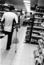 BIH, Bosnia, Tuzla, 17.07.2005, amputee while purchasing