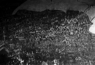 BIH, Bosnia, Screbrenica, 10.07.2005, Graffitti on the wall of the entrance to a discotheque
