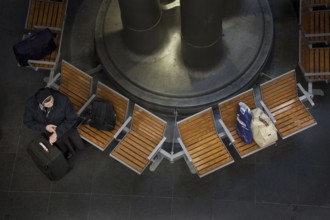 Berlin 2010-11-24 A woman waits for her train at Berlin Central Station. DEU Berlin 2010-11-24 A