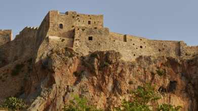 Historic castle wall on rocky cliff under clear sky, Monemvasia, Monemvassia, Malvasy, Byzantine