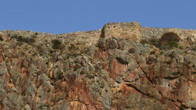 Brick ruins on a rocky landscape under blue sky, Monemvasia, Monemvassia, Malvasy, Byzantine small