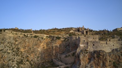 Drone shot, Old rock castle rising above the coastal landscape, Monemvasia, Monemvassia, Malvasy,